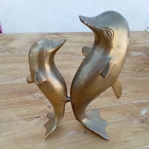 Brass dolphins